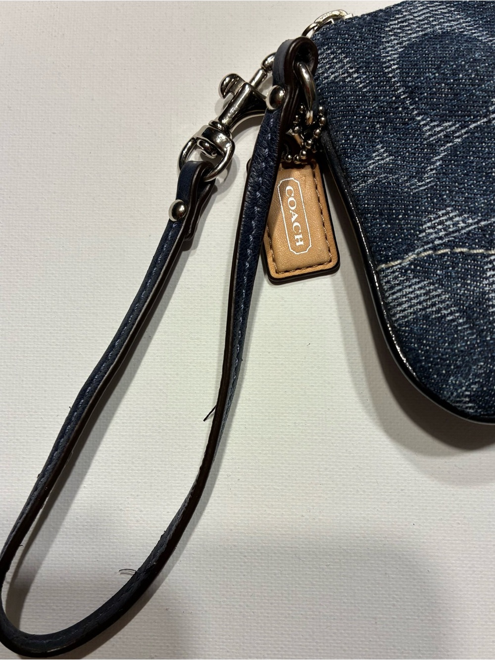 Coach Poppy Blue Signature
Denim/Leather Wristlet - Picture 11 of 16
